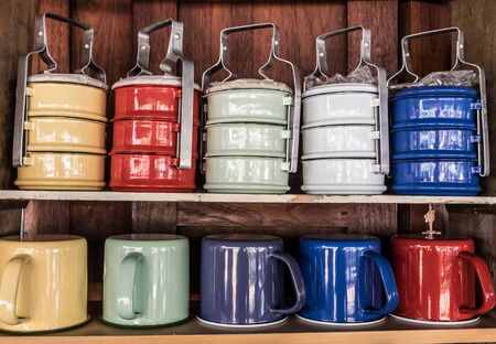 colorful retro food carrier on woodの写真素材