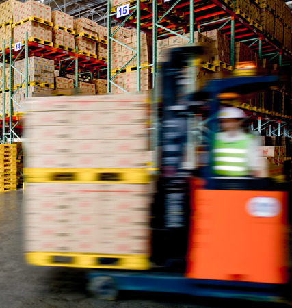 forklift in the large modern warehouseのeditorial素材