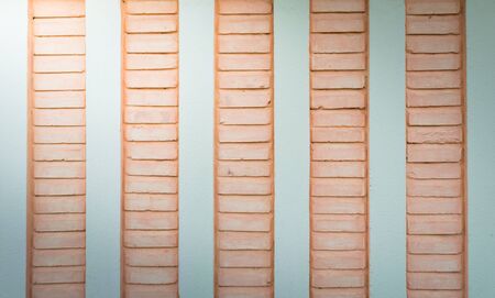 brick wall background  with light from cornerの写真素材