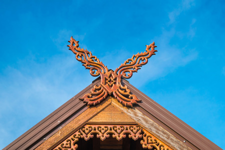 north thai house roof with sky backgroundの写真素材