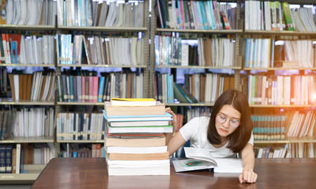 Young Girl Student with Glasses Reading book Overlap Serious, Hard Exam, Quiz, Test Sleeping...