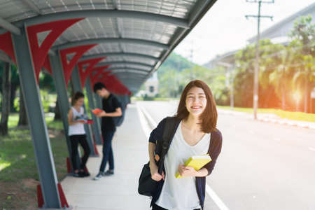 Young Students Group with School Folders Book in Education Campus University Outdoorの写真素材
