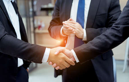 Two Businessman handshake teamwork partner and boss clap for working success project finish completeの写真素材