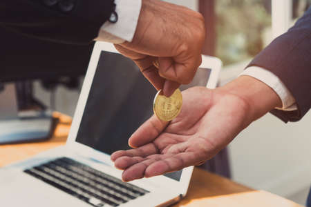 Businessman send bitcoin and receive money exchange with laptop computer, Digital money trade...