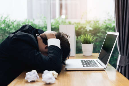 Businessman failure project plan deadline serious emotion and depression or deadline at office room...