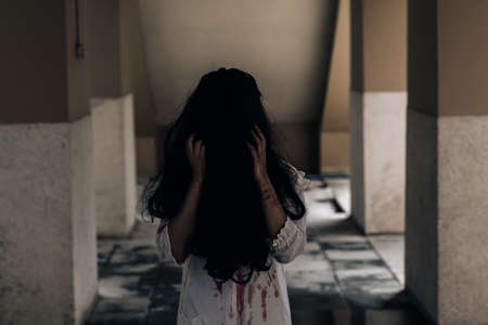 Horror scene of ghost woman death halloween festival in the dark houseの写真素材