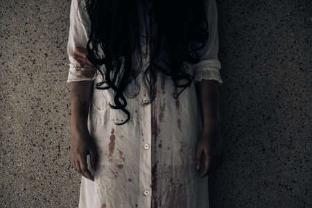 Horror scene of ghost woman death halloween festival in the dark houseの写真素材