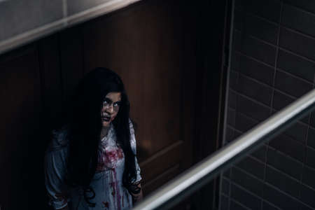Horror scene of ghost woman death halloween festival in the dark houseの写真素材