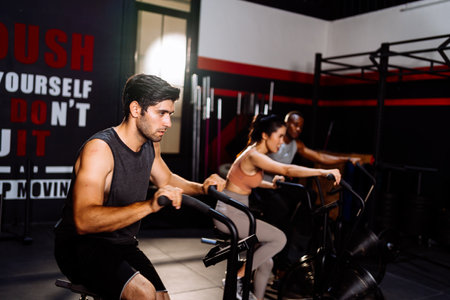Athlete Sporty Group Cardio Exercise Burning Calorie in Fitness Gym Fit Body Healthy Lifestyle Athlete Muscle Building Strong Endurance in Health Club.の写真素材
