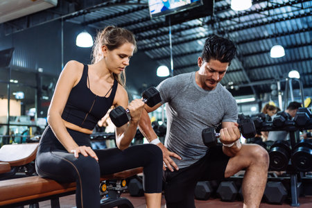 Coaching Woman Basic Workout Exercise in Fitness Gym Weight Training Healthy Lifestyle bodybuilding, Athlete doing Deadlift with barbell for builder muscles sportive.の写真素材