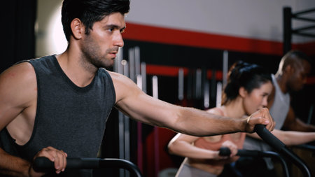 Athlete Sporty Group Cardio Exercise Burning Calorie in Fitness Gym Fit Body Healthy Lifestyle Athlete Muscle Building Strong Endurance in Health Club.の写真素材