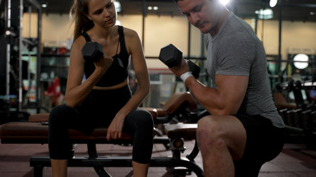 Coaching Woman Basic Workout Exercise in Fitness Gym Weight Training Healthy Lifestyle bodybuilding, Athlete doing Deadlift with barbell for builder muscles sportive.の写真素材