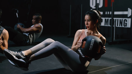 Athlete Sporty Group Cardio Exercise Burning Calorie HIIT in Fitness Gym Fit Body Healthy Lifestyle Athlete Muscle Building Strong Endurance in Health Club.の写真素材