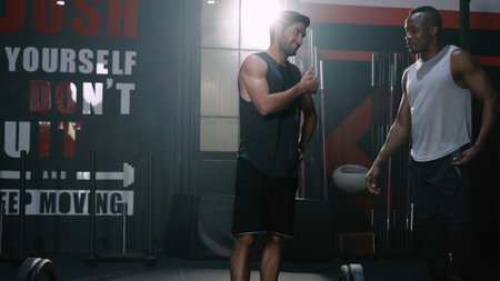 Coach Training Athlete Sportman Workout Exercise in Fitness Gym Healthy Lifestyle bodybuilding, Athlete doing Deadlift with barbell for builder muscles sportive.の写真素材