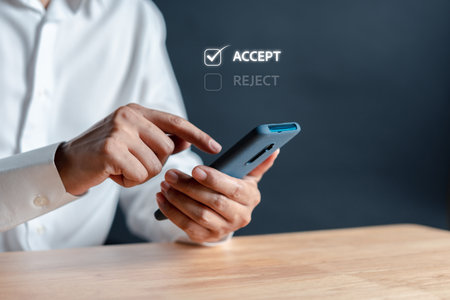 Businessman use smartphone control Intelligent car app eco system vehicle and smart cars with showing icon of the car and information about parking location, fuel, energy saving, service and security.の写真素材