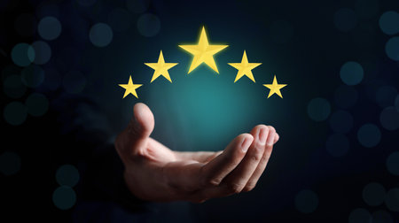 Businessman holding five stars for customer feedback and evaluation in experience service and product. Excellent rating. User give rating, good business network score.の写真素材