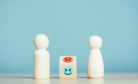 Conflict between couple difference of thought misunderstanding between men and women. Human wooden model of emotion happy and angry. people of love and life concept.の写真素材