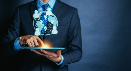 Businessman holding tablet control and remote virtual management graphic icon. People remote online team. Planning business project teamwork internet and network concept.の写真素材