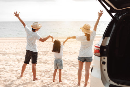 Family travel car road trip concept. summer vacation in car in the sunset, Dad, mom and daughter happy traveling enjoy and relaxation together driving in holidays, people,lifestyle with transportationの写真素材