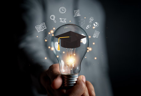 E-learning graduate certificate program concept. man hands showing graduation hat, Internet education course degree, study knowledge to creative thinking idea and problem solving solutionの写真素材