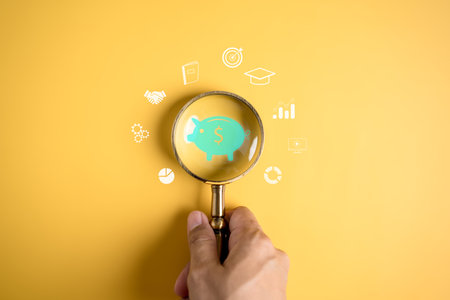 Magnifier focus to piggy bank icon for saving education, study learning for future, education course degree, study knowledge to creative thinking idea and problem solving solutionの写真素材