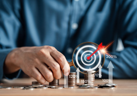 Businessman future target stacking money coins accounting for increase financial interest rate and...