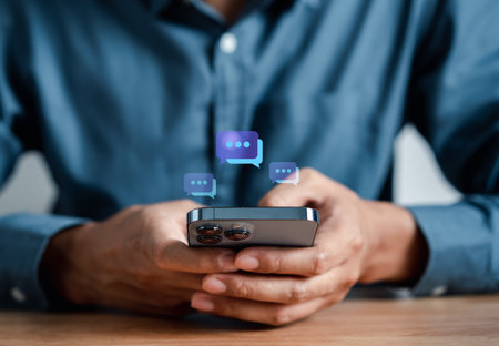Businessman using smartphone chatting to send message to communication and social network connection online  technology concept.の写真素材