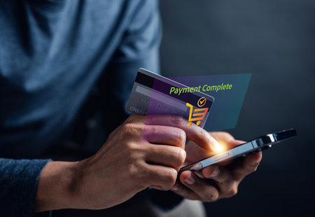 Shopping online payment concept. Man hand using smart phone with cart delivery icon, banking and...