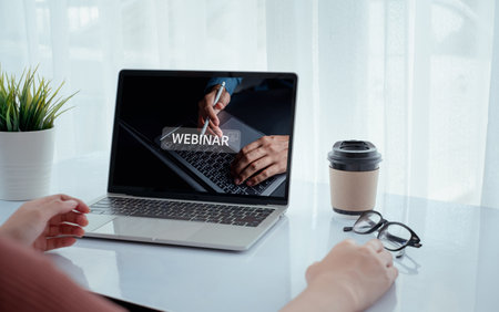 Busineswoman using computer with Webinar meeting conference, E-business Connection, online technology, online education and e-learning diploma, Communication technology on web. teamwork online seminar.の写真素材