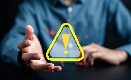System warning caution sign for notification error and maintenance concept. cyber attack on computer network. Cybersecurity vulnerability, data breach, illegal connection, compromised information.の写真素材