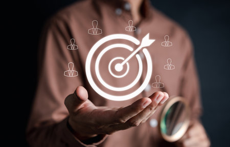 Business targeting objective of Customer Connection concept. Businessman holding virtual dart foccus network data global business and human icon, Data exchange in community and media sharing concept.の写真素材