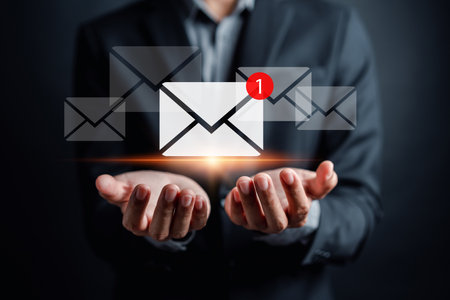 Businessman sending email by laptop computer to customer, business contact and communication, email...