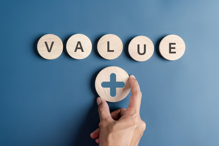 Business hand picking value added download progress and profit to benefit growth and development in...