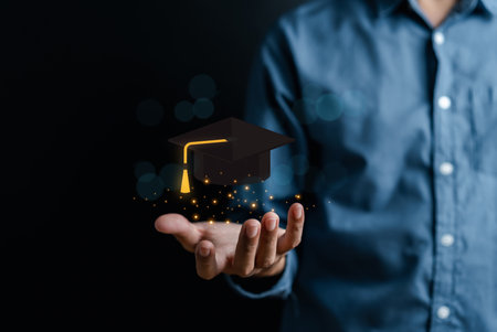 Hand holding education cap, leading to success goal. Taking strategic steps towards graduation. Career path and first for business, Graduation achievement goals concept. Graduation cap.の写真素材