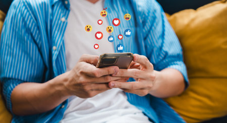 Man using social media and digital online, man using smart phone with Social media. concept of living on vacation and playing social media. online marketing, technology network concept.の写真素材