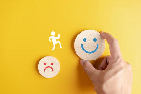 Human icon change and jumping to happy smile face feeling concept. mental health positive thinking.の写真素材