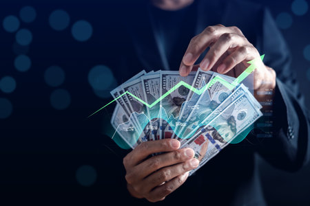 Businessman holding banknote finance and investment. Capital gain world money economic growth. cash...