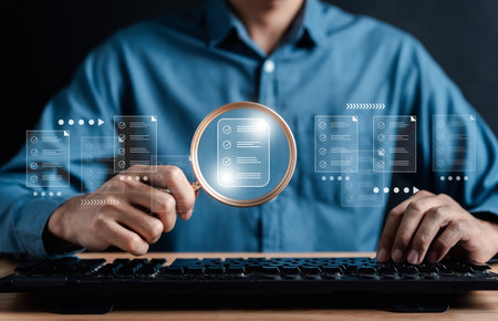 Online survey filling out and digital form checklist by laptop computer, Document Management Checking System, online documentation database and process manage files.の写真素材
