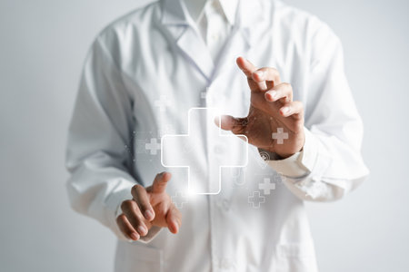 Doctor holding plus sign for treatment technology of hospital and clinic service or healthcare insurance symbol concept, Mental health care and medical concept.の写真素材