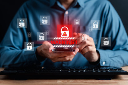 Alert System hacked popup on screen, spam virus with warning caution for notification on internet security protect, code and cyber security and phishing spyware and compromised information.の写真素材