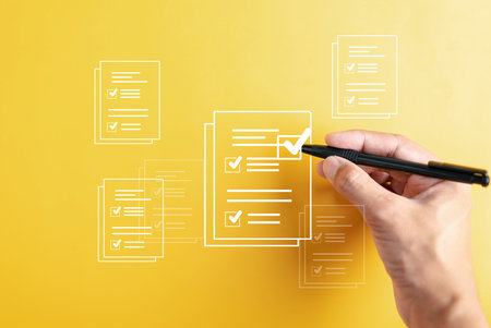 Online survey filling out and digital form checklist by laptop computer, Document Management Checking System, online documentation database and process manage files.の写真素材
