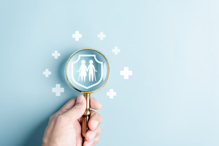 Magnifier focus to Protection family senior couple with plus sign icon, life and insurance concept. Family life insurance and policy.の写真素材