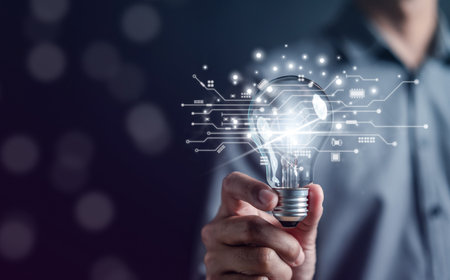 Man hand holding lightbulb start new idea and using a technology for creativity, innovation, future concept. corporate business strategy.の写真素材