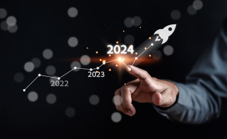 Pointing Happy New year 2024 with chart graph and countdown merry christmas and happy new year, Planning and challenge strategy business in new year 2024 Concept.の写真素材