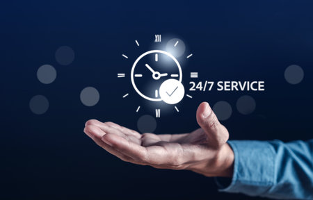 Nonstop service 24 hr concept. businessman hand holding virtual 24/7 with clock on hand for worldwide nonstop and full-time available contact of service concept. customer service.の写真素材