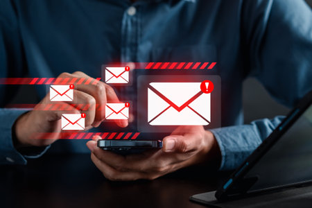 Alert Email inbox and spam virus with warning caution for notification on internet letter security protect, junk and trash mail and compromised information.の写真素材