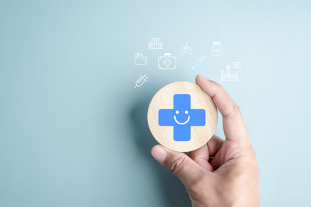 Health insurance and medical welfare concept. people hands holding plus symbol and healthcare medical icon, health and access healthcare.の写真素材