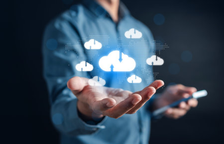 Businessman using smart phone cloud computing to download and loading data information and upload on system network application. Technology transformationの写真素材