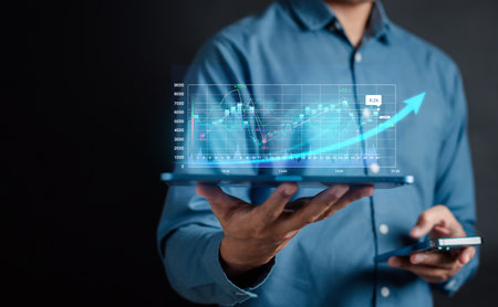 Businessman Analyst working with computer in Business Analytics and Data Management System to make report connected to database. Corporate strategy for finance, operations, sales, marketing.の写真素材