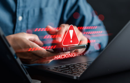 Alert System hacked popup on screen, spam virus with warning caution for notification on internet security protect, code and cyber security and phishing spyware and compromised information.の写真素材